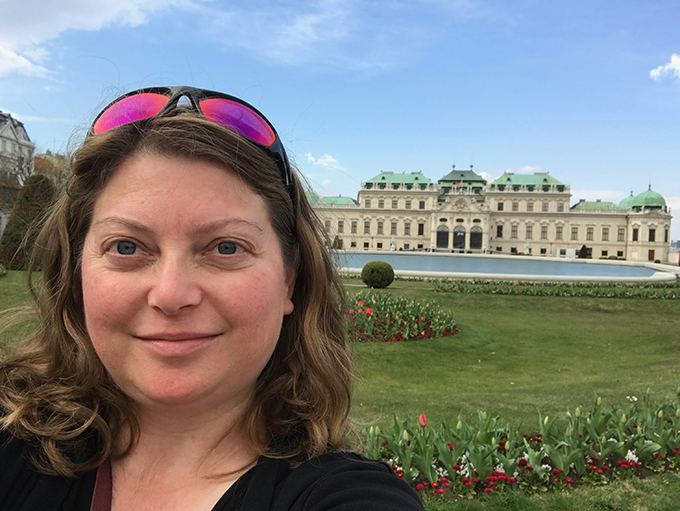 Color photo of Heather Cassell at the Belvedere Palace in Vienna. No text. No link.